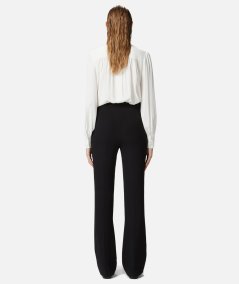 Flared trousers in technical cady