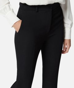 Flared trousers in technical cady